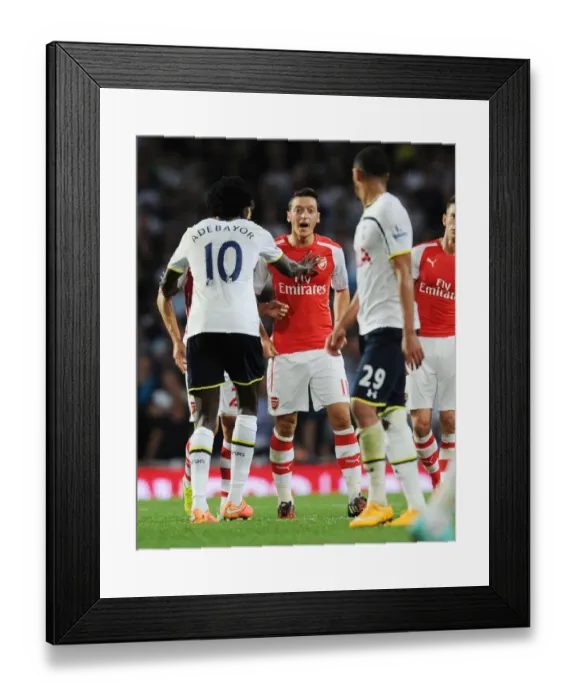 Framed Print : Clash of Rivals: Arsenal vs. Tottenham, Ozil vs. Adebayor Framed Print : Clash of Rivals: Arsenal vs. Tottenham, Ozil vs. Adebayor
