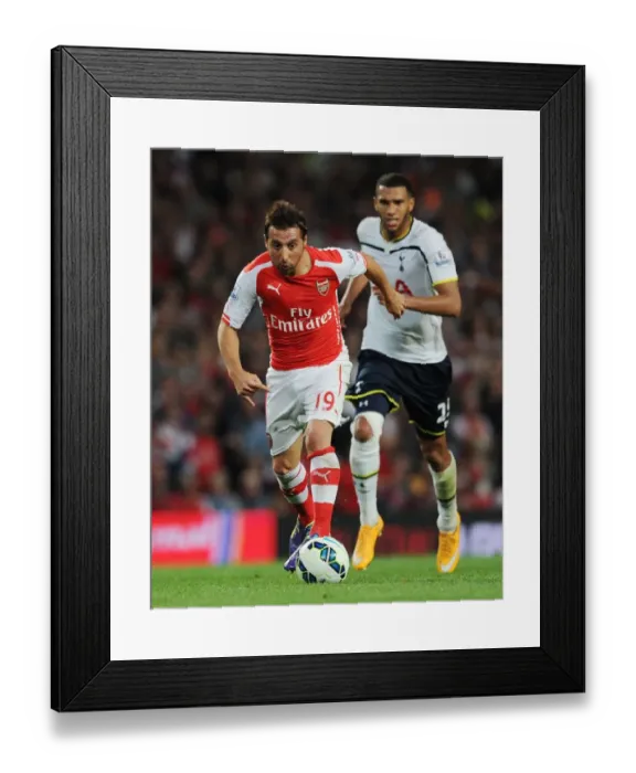 Framed Print : Arsenal's Santi Cazorla Faces Off Against Tottenham in the 2014-15 Premier League Framed Print : Arsenal's Santi Cazorla Faces Off Against Tottenham in the 2014-15 Premier League