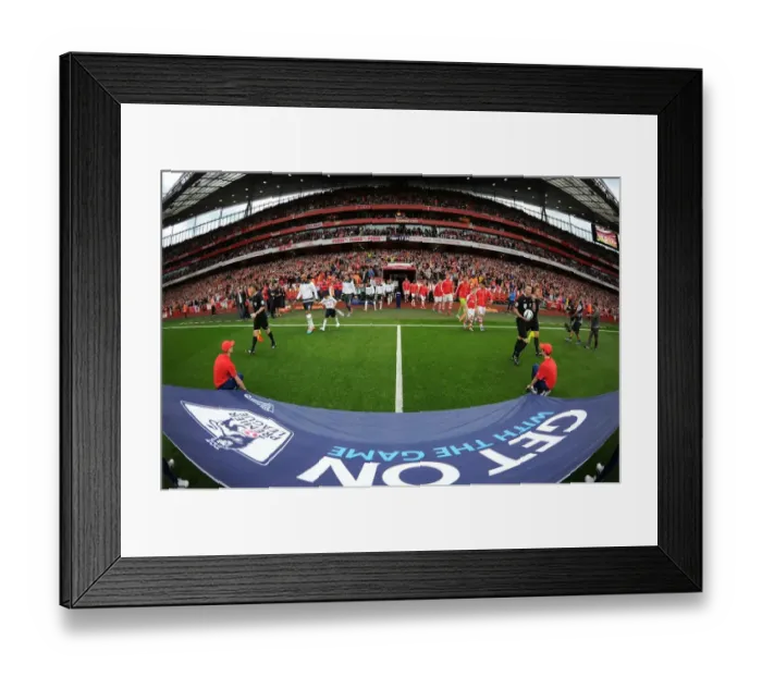 Framed Print : Arsenal vs. Tottenham: Premier League Clash at Emirates Stadium
