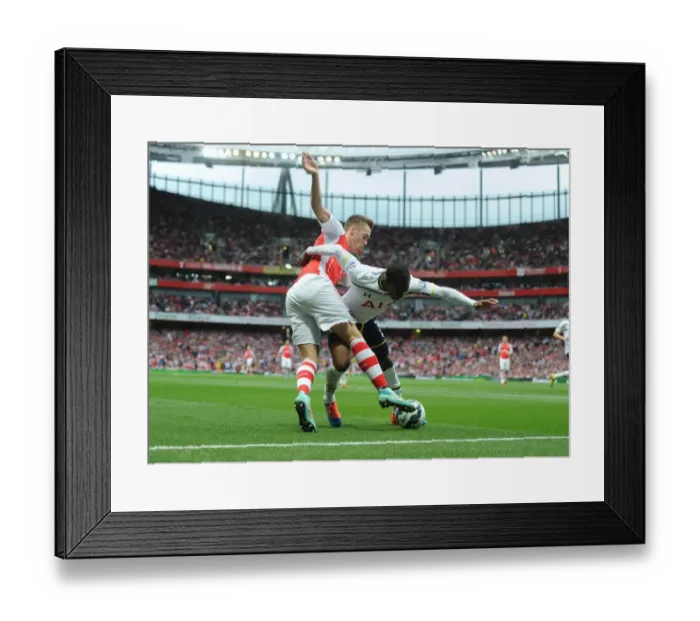 Framed Print : Clash at the Emirates: Chambers vs. Rose - Arsenal vs. Tottenham Premier League Showdown Framed Print : Clash at the Emirates: Chambers vs. Rose - Arsenal vs. Tottenham Premier League Showdown