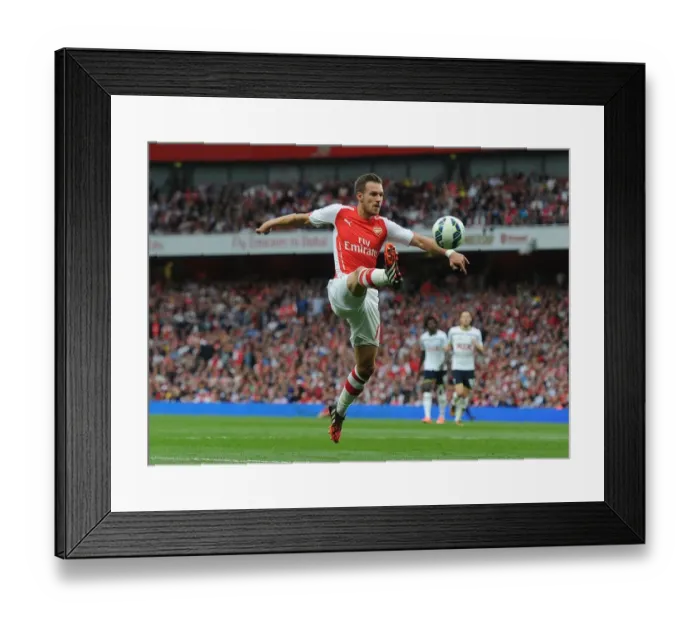 Framed Print : Aaron Ramsey in Action: Arsenal vs. Tottenham, Premier League 2014-15 Framed Print : Aaron Ramsey in Action: Arsenal vs. Tottenham, Premier League 2014-15