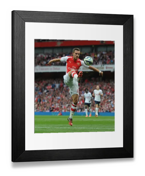 Framed Print : Aaron Ramsey: In Action Against Rival Tottenham in the Premier League (2014-15)