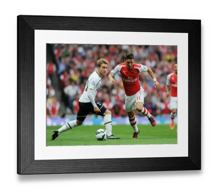 Framed Print : Mesut Ozil vs. Christian Eriksen: Battle at the Emirates - Arsenal v Tottenham, Premier League 2014-15