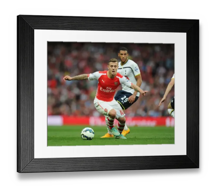 Framed Print : Jack Wilshere: Arsenal vs. Tottenham Showdown, Premier League 2014-15 Framed Print : Jack Wilshere: Arsenal vs. Tottenham Showdown, Premier League 2014-15