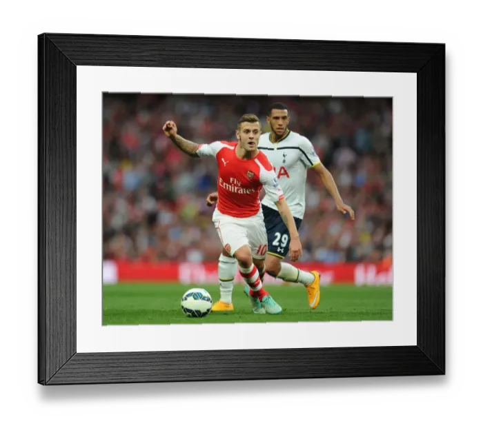Framed Print : Jack Wilshere vs. Etienne Capoue: Battle in the Midfield - Arsenal v Tottenham, Premier League 2014-15