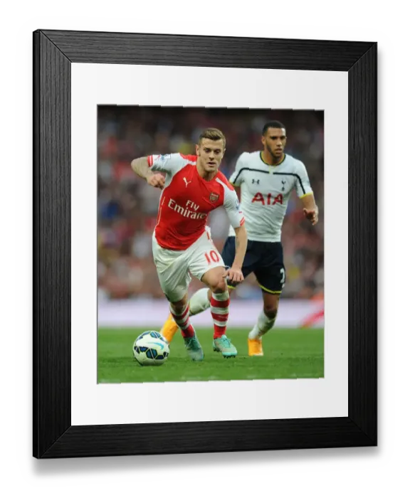 Framed Print : Arsenal's Jack Wilshere vs. Tottenham's Etienne Capoue: A Midfield Showdown in the 2014-15 Premier League Clash Framed Print : Arsenal's Jack Wilshere vs. Tottenham's Etienne Capoue: A Midfield Showdown in the 2014-15 Premier League Clash