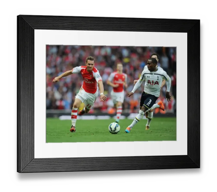 Framed Print : Ramsey Surges Past Rose: Intense Moment from the Arsenal v Tottenham Rivalry Framed Print : Ramsey Surges Past Rose: Intense Moment from the Arsenal v Tottenham Rivalry