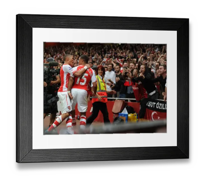 Framed Print : Arsenal Celebrate: Oxlade-Chamberlain's Goal vs. Tottenham (2014-15) Framed Print : Arsenal Celebrate: Oxlade-Chamberlain's Goal vs. Tottenham (2014-15)