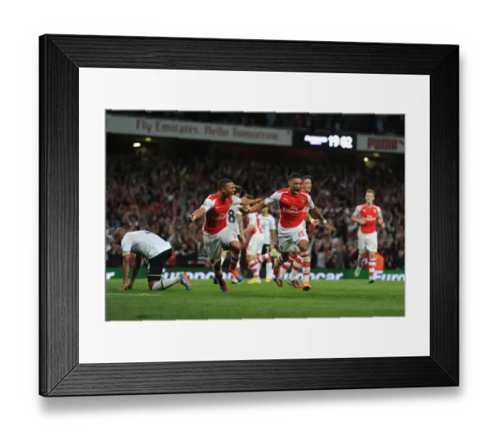 Framed Print : Arsenal's Oxlade-Chamberlain Scores Dramatic Winner Against Tottenham in 2014-15 Premier League Clash Framed Print : Arsenal's Oxlade-Chamberlain Scores Dramatic Winner Against Tottenham in 2014-15 Premier League Clash