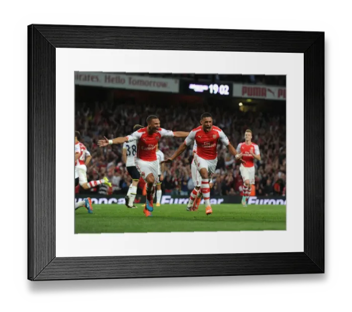 Framed Print : Arsenal vs. Tottenham: Oxlade-Chamberlain's Goal Celebration at Emirates Stadium (2014-15) Framed Print : Arsenal vs. Tottenham: Oxlade-Chamberlain's Goal Celebration at Emirates Stadium (2014-15)