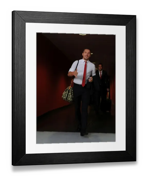 Framed Print : Arsenal FC vs. Galatasaray AS: Lukas Podolski Prepares for Champions League Clash at Emirates Stadium Framed Print : Arsenal FC vs. Galatasaray AS: Lukas Podolski Prepares for Champions League Clash at Emirates Stadium