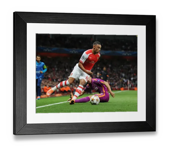 Framed Print : Arsenal's Oxlade-Chamberlain Outmaneuvers Galatasaray's Telles in 2014 Champions League Clash Framed Print : Arsenal's Oxlade-Chamberlain Outmaneuvers Galatasaray's Telles in 2014 Champions League Clash