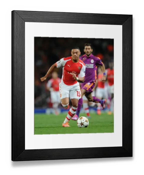 Framed Print : Arsenal FC vs Galatasaray: Oxlade-Chamberlain in Champions League Action at Emirates Stadium Framed Print : Arsenal FC vs Galatasaray: Oxlade-Chamberlain in Champions League Action at Emirates Stadium