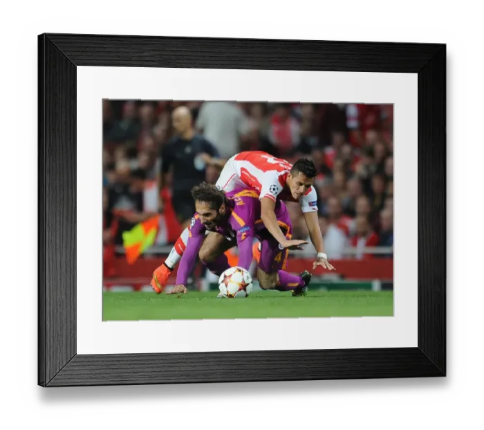 Framed Print : Arsenal's Alexis Sanchez Stumbles Against Galatasaray's Hamit Altintop - UEFA Champions League 2014 Framed Print : Arsenal's Alexis Sanchez Stumbles Against Galatasaray's Hamit Altintop - UEFA Champions League 2014