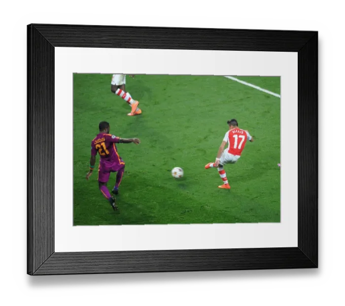 Framed Print : Alexis Sanchez Scores Third Goal Against Aurelien Chedjou in Arsenal's UEFA Champions League Victory Framed Print : Alexis Sanchez Scores Third Goal Against Aurelien Chedjou in Arsenal's UEFA Champions League Victory