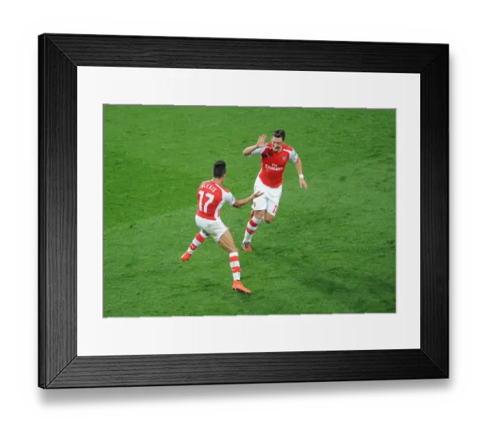 Framed Print : Alexis Sanchez and Mesut Ozil's Triumphant Moment: Arsenal's Third Goal vs. Galatasaray (2014 / 15 Champions League)
