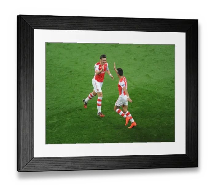 Framed Print : Sanchez and Ozil Celebrate Arsenal's Champions League Goals Against Galatasaray (2014) Framed Print : Sanchez and Ozil Celebrate Arsenal's Champions League Goals Against Galatasaray (2014)