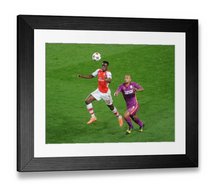 Framed Print : Clash of the Midfield: Welbeck vs. Melo in the Champions League
