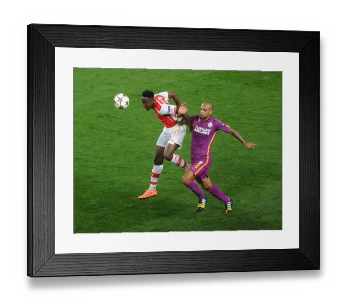 Framed Print : Arsenal's Danny Welbeck vs. Felipe Melo: A Champions League Battle Framed Print : Arsenal's Danny Welbeck vs. Felipe Melo: A Champions League Battle