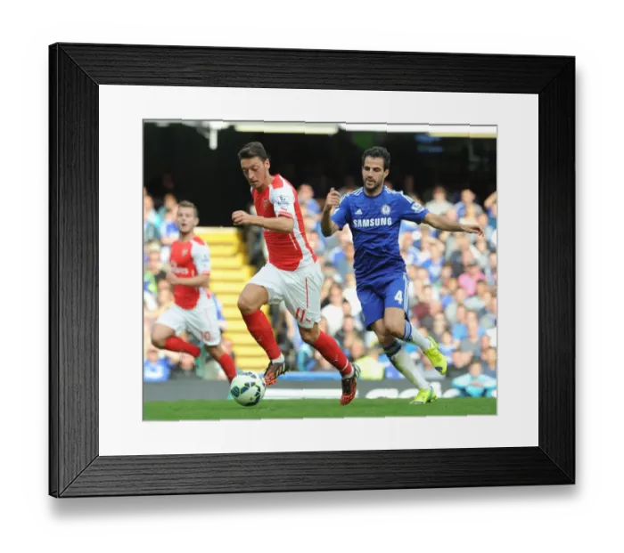 Framed Print : Clash of the Legends: Ozil vs. Fabregas - A Premier League Rivalry Reignited (Chelsea vs. Arsenal, 2014-15) Framed Print : Clash of the Legends: Ozil vs. Fabregas - A Premier League Rivalry Reignited (Chelsea vs. Arsenal, 2014-15)