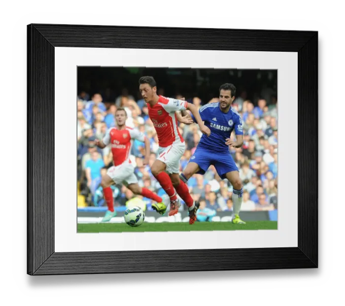 Framed Print : Clash of the Legends: Ozil vs. Fabregas - Arsenal vs. Chelsea, Premier League 2014-15