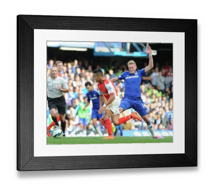 Framed Print : Clash at Stamford Bridge: Alexis Sanchez Fouls by Schurrle in Chelsea vs Arsenal Premier League Match (2014-15) Framed Print : Clash at Stamford Bridge: Alexis Sanchez Fouls by Schurrle in Chelsea vs Arsenal Premier League Match (2014-15)