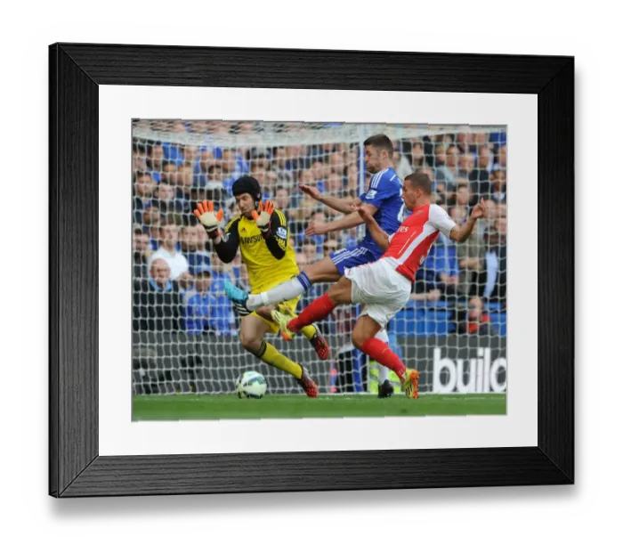 Framed Print : Podolski's Tight Shot Against Chelsea in the 2014-15 Premier League Framed Print : Podolski's Tight Shot Against Chelsea in the 2014-15 Premier League