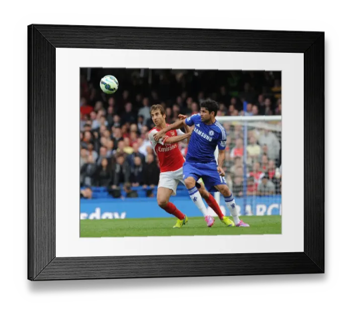 Framed Print : Flamini Clashes with Costa: Intense Battle in Chelsea vs. Arsenal Premier League Clash (2014-15)