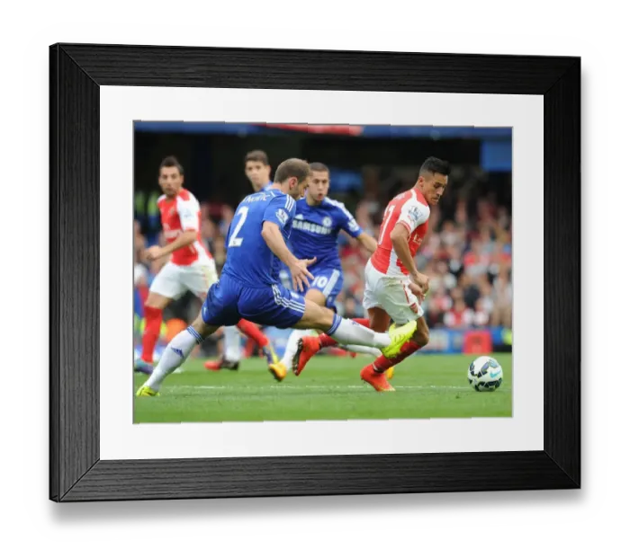 Framed Print : Clash of Titans: Alexis Sanchez vs. Branislav Ivanovic - Chelsea vs. Arsenal, Premier League 2014-15 Framed Print : Clash of Titans: Alexis Sanchez vs. Branislav Ivanovic - Chelsea vs. Arsenal, Premier League 2014-15