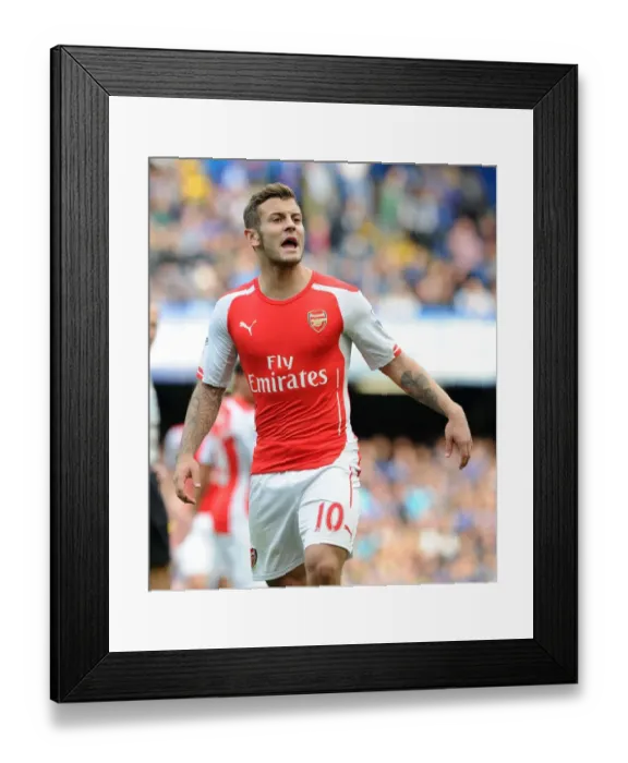 Framed Print : Jack Wilshere Faces Off Against Chelsea in the 2014-15 Premier League