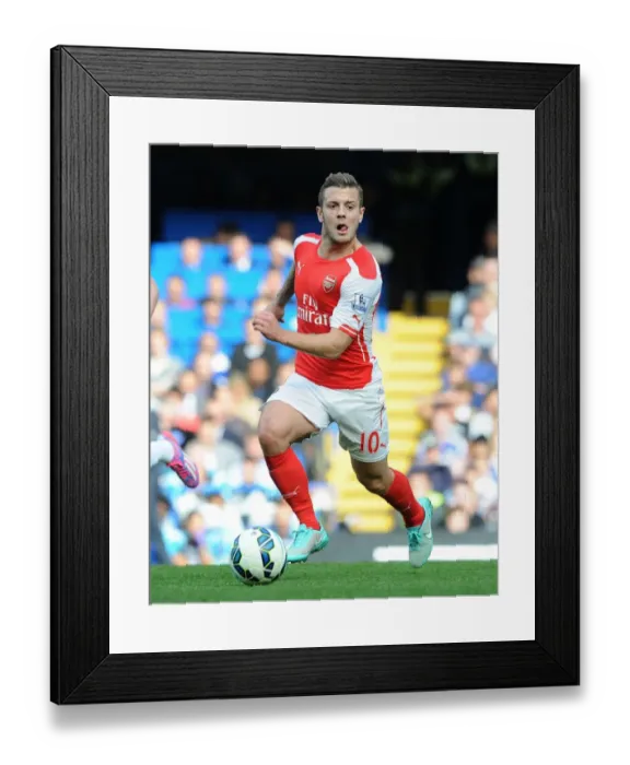 Framed Print : Jack Wilshere Faces Off Against Chelsea in Premier League Showdown (2014-15) Framed Print : Jack Wilshere Faces Off Against Chelsea in Premier League Showdown (2014-15)