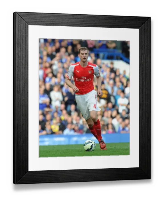 Framed Print : Arsenal's Per Mertesacker at Chelsea's Stamford Bridge: Premier League Clash 2014-15 Framed Print : Arsenal's Per Mertesacker at Chelsea's Stamford Bridge: Premier League Clash 2014-15