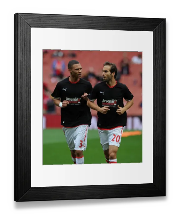 Framed Print : Kieran Gibbs and Mathieu Flamini (Arsenal) in their Arsenal for Everyone T Shirt