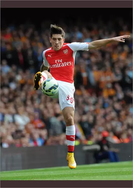 Hector Bellerin: Arsenal's Unyielding Defender in the 2-2 Battle with Hull City (Barclays Premier League, Emirates Stadium, October 18, 2014)
