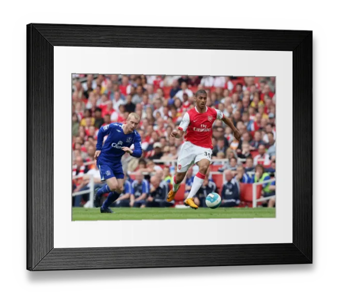 Framed Print : Armand Traore (Arsenal) Tony Hibbert (Everton)