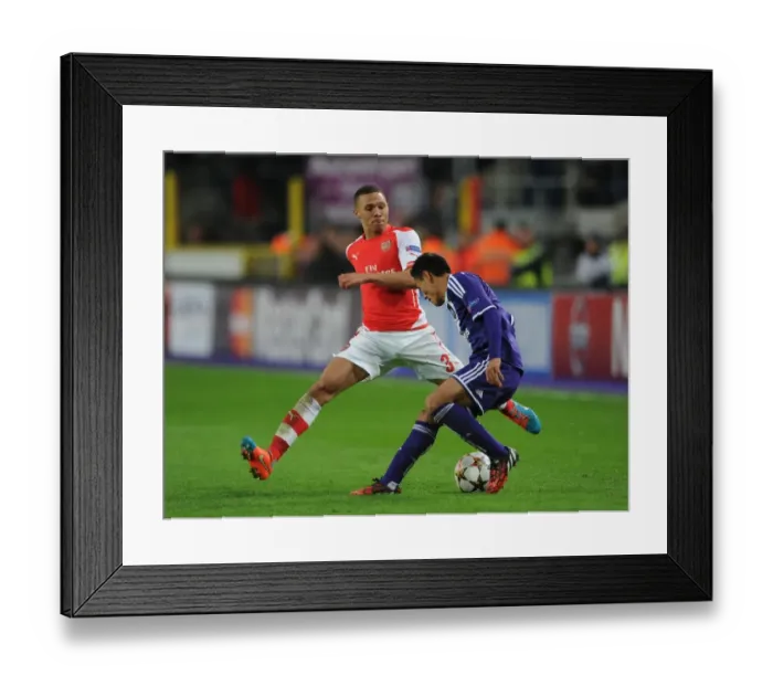 Framed Print : Kieran Gibbs vs. Andy Najar: A Battle in the UEFA Champions League Between RSC Anderlecht and Arsenal Framed Print : Kieran Gibbs vs. Andy Najar: A Battle in the UEFA Champions League Between RSC Anderlecht and Arsenal