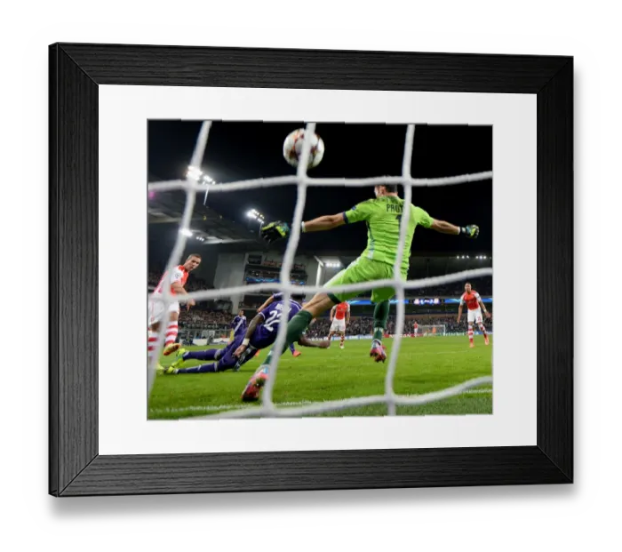 Framed Print : Lukas Podolski Scores Against Silvio Proto: Arsenal's Victory in Anderlecht (Champions League 2014-15) Framed Print : Lukas Podolski Scores Against Silvio Proto: Arsenal's Victory in Anderlecht (Champions League 2014-15)