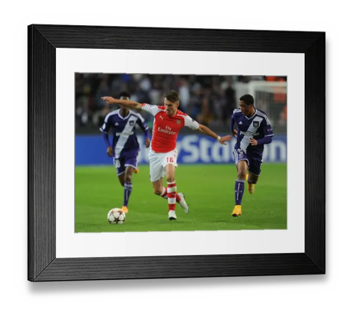 Framed Print : Clash of Midfielders: Ramsey vs. Tielemans in the UEFA Champions League Framed Print : Clash of Midfielders: Ramsey vs. Tielemans in the UEFA Champions League