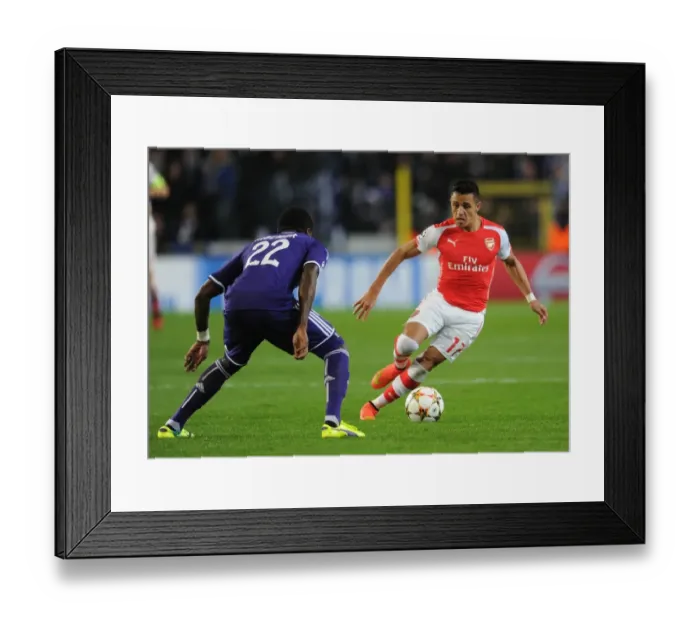 Framed Print : Clash of Stars: Sanchez vs. Mbemba in the UEFA Champions League