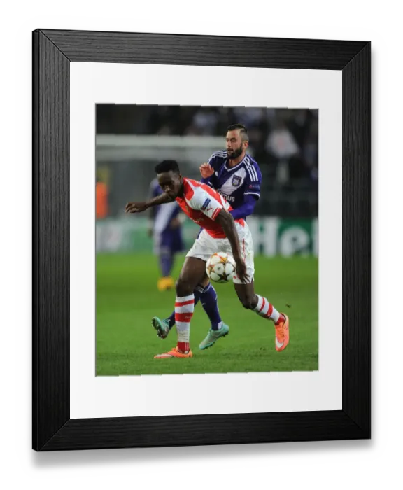 Framed Print : Intense Rivalry: Welbeck vs. Defour - Arsenal's Champions League Battle Framed Print : Intense Rivalry: Welbeck vs. Defour - Arsenal's Champions League Battle