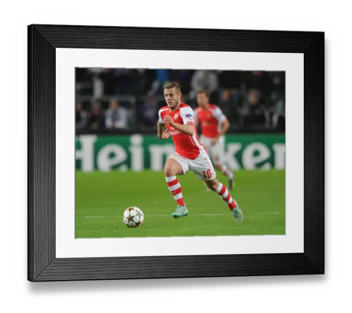 Framed Print : Jack Wilshere in Action: Arsenal vs. RSC Anderlecht, UEFA Champions League, 2014