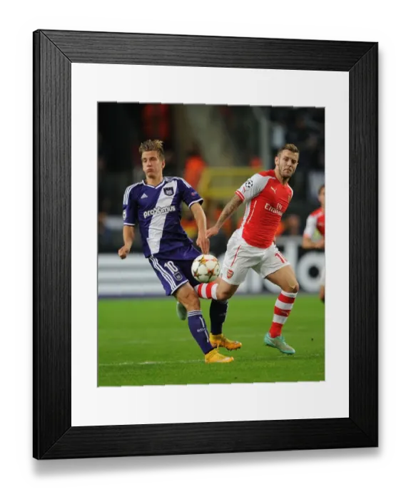 Framed Print : Jack Wilshere vs. Dennis Praet: Battle in the Midfield - Arsenal vs. Anderlecht, UEFA Champions League, 2014