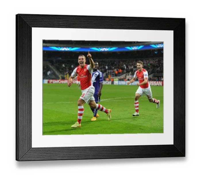 Framed Print : Lukas Podolski Scores Arsenal's Second Goal Against RSC Anderlecht in the 2014-15 UEFA Champions League
