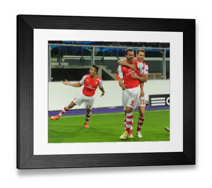 Framed Print : Anderlecht vs. Arsenal: Podolski Scores Double as Gunners Triumph in Champions League Clash (October 2014)