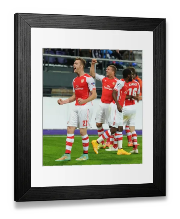 Framed Print : Chambers and Podolski Celebrate Arsenal's Goals in Anderlecht Victory, UEFA Champions League 2014-15 Framed Print : Chambers and Podolski Celebrate Arsenal's Goals in Anderlecht Victory, UEFA Champions League 2014-15