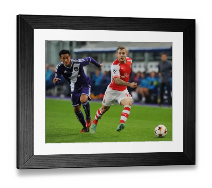 Framed Print : Jack Wilshere vs. Andy Najar: Battle in the Midfield - Arsenal vs. RSC Anderlecht, UEFA Champions League, 2014
