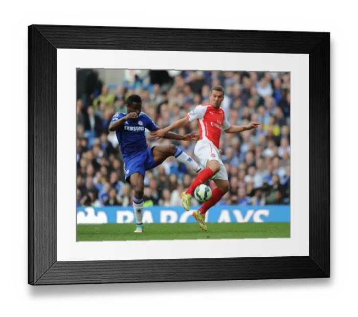 Framed Print : Clash at Stamford Bridge: Lukas Podolski vs. John Mikel Obi, Premier League Showdown