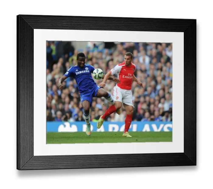 Framed Print : Clash at Stamford Bridge: Podolski vs. Mikel Obi - A Football Battle Framed Print : Clash at Stamford Bridge: Podolski vs. Mikel Obi - A Football Battle