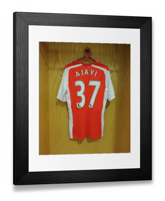 Framed Print : Arsenal Changing Room: Semi Ajayi Prepares for Arsenal v Hull City (2014-15) Framed Print : Arsenal Changing Room: Semi Ajayi Prepares for Arsenal v Hull City (2014-15)