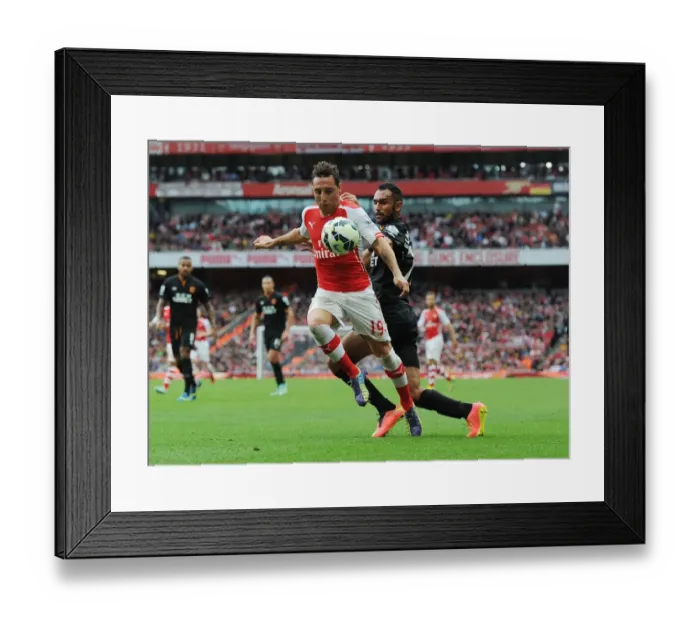 Framed Print : Clash at Emirates: Cazorla vs. Elmohamady